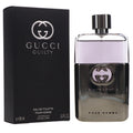 Gucci Guilty Pour Homme perfume bottle and packaging on a white background